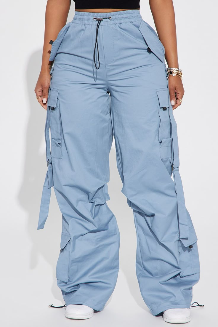 Available In Slate Blue. Cargo Pant High Waist Elastic Waistband Strap Detail Hand Pockets Cargo Pockets Faux Back Pockets Adjustable Toggle Detail Wide Leg Non Stretch 30" Inseam 100% Cotton Imported | Don't Mess Around Cargo Pant in Slate Blue size Small by Fashion Nova Blue Cargo Pants Outfit, Blue Cargo Pants, Cargo Pants Outfit, Clothing Designs, Swimming Outfit, Cargo Pant, Slate Blue, Pants Outfit, High Waisted Pants