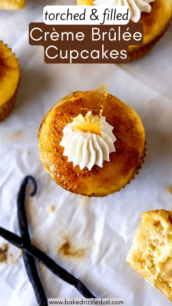 some cupcakes with icing on top of them next to black handled scissors