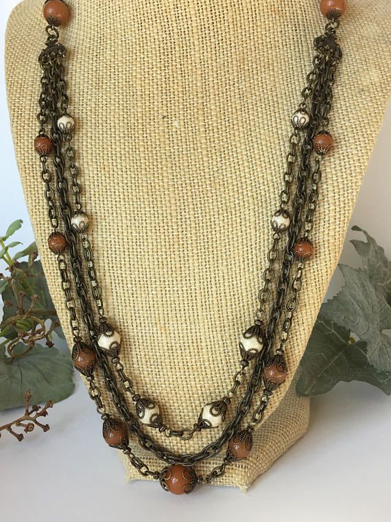 Handmade multistrand semiprecious gemstones and antique brass Affordable Vintage Multi-strand Beaded Necklaces, Beach Stones Jewelry, Three Strand Necklace, Brass Necklace, Madison Wi, Boho Casual, Bead Caps, Brass Chain, Etsy Jewelry