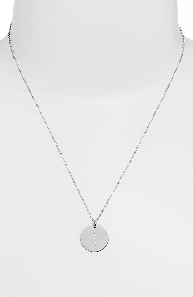 From humble beginnings to a fully staffed warehouse in Bend, Oregon, Nashelle remains true to its original purpose-handmade jewelry crafted with love and intention. A hand-stamped initial is centered on a gorgeous sterling silver disc attached to a chain-link necklace. Style Name:Nashelle Sterling Silver Initial Disc Necklace. Style Number: 813134. Engraved Stainless Steel Jewelry With Initial Pendant, Dainty White Gold Jewelry With Engraving Option, Silver Initial Pendant Jewelry For Everyday, Silver Hand Stamped Round Pendant Jewelry, Silver Hand-stamped Round Pendant Jewelry, Minimalist Silver Jewelry With Engraving Option, Elegant Silver Hand Stamped Charm Necklaces, Silver Stainless Steel Jewelry With Engraving Option, Sterling Silver Anniversary Initial Necklace