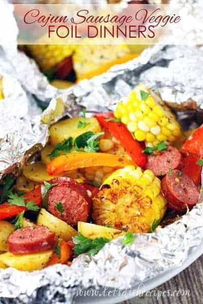 corn, sausage and veggie foil dinner is ready to be eaten