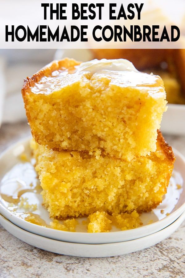 two pieces of cornbread on a plate with the words, the best easy homemade cornbread