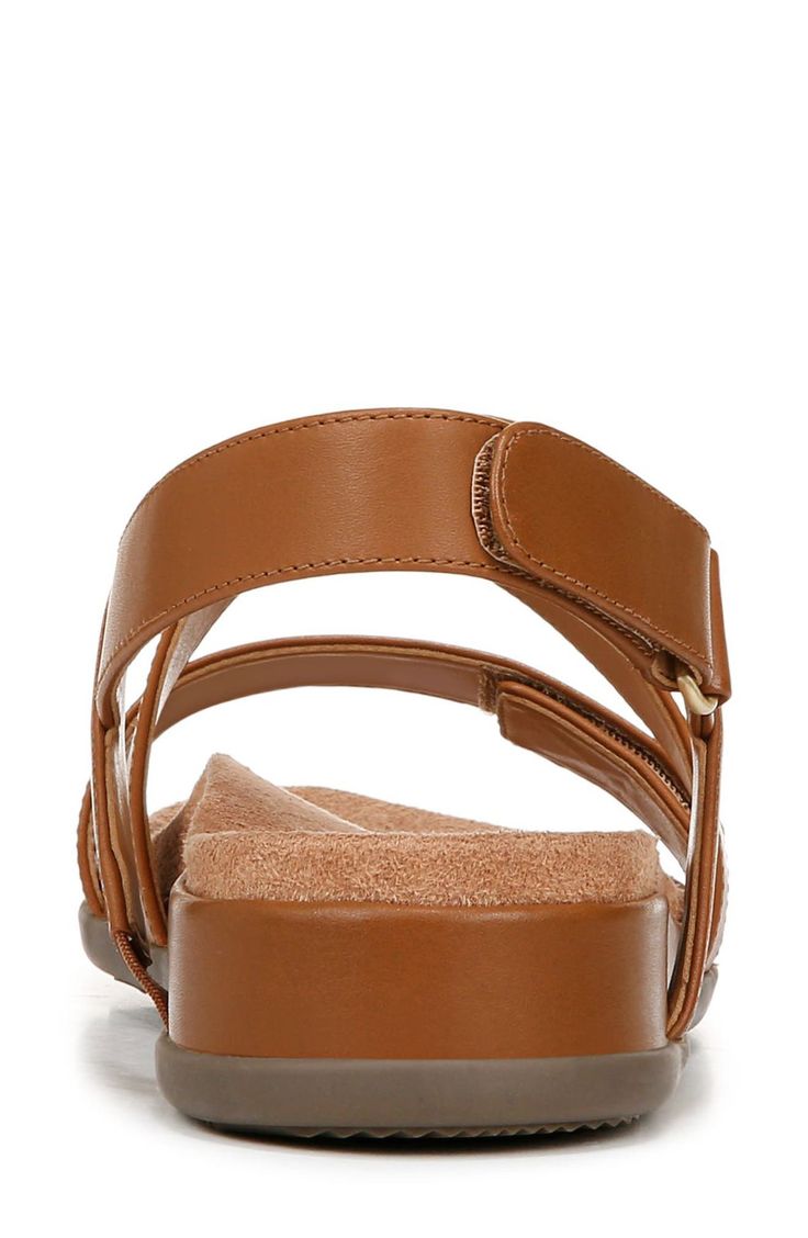 Adjustable straps offer a customized fit in a sleek leather sandal grounded by a contoured footbed and subtle wedge heel. 1 1/2" heel; 3/4" platform Adjustable straps with hook-and-loop closures Contoured footbed with arch support Leather upper/synthetic lining/rubber sole Imported Leather Working Group certified This product meets Nordstrom Responsible Sourcing and Manufacturing criteria: made with practices that meet higher environmental or social standards Cushioned Slingback Wedge Sandals In Synthetic, Slingback Synthetic Wedge Sandals With Cushioned Footbed, Synthetic Double Strap Wedge Sandals, Cushioned Slingback Wedge Sandals, Slingback Wedge Sandals With Cushioned Footbed, Adjustable Slingback Sandals With Cushioned Footbed, Adjustable Cushioned Slingback Sandals, Adjustable Slingback Synthetic Footbed Sandals, Adjustable Slingback Footbed Sandals With Arch Support