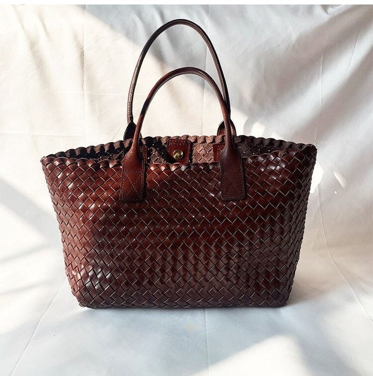 [Note]: Due to product value and convenience to contact you at the time of delivery, please note that your phone number, thank you! 【parameter】 100%pure hand -woven Material: head layer cowhide Size: 25cm height, 45cm upper width, 33cm bottom width, 13cm thick, and 20cm of the handle height Modern method: handbag, shoulder bag Color: brown 【maintainance】 1. The bag needs to be wiped with a dry towel. Do not wipe the bag with a wet towel. 2. Avoid leather bags in a direct sunlight, because this w Luxury Brown Handwoven Bags, Luxury Handwoven Brown Bag, Luxury Brown Bag With Interwoven Design, Luxury Brown Handwoven Shoulder Bag, Cheap Brown Handwoven Shoulder Bag, Cheap Vintage Woven Bags, Slouchy Hobo Bag, Woven Leather Bag, Boho Handbags