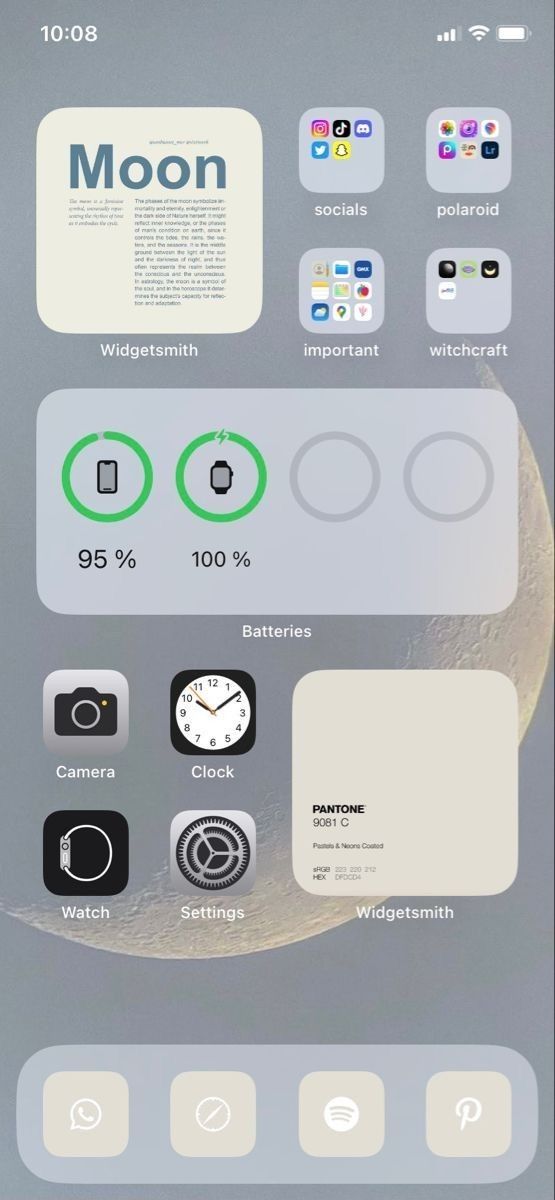 an iphone screen with icons on it and the words moon in green, white and black