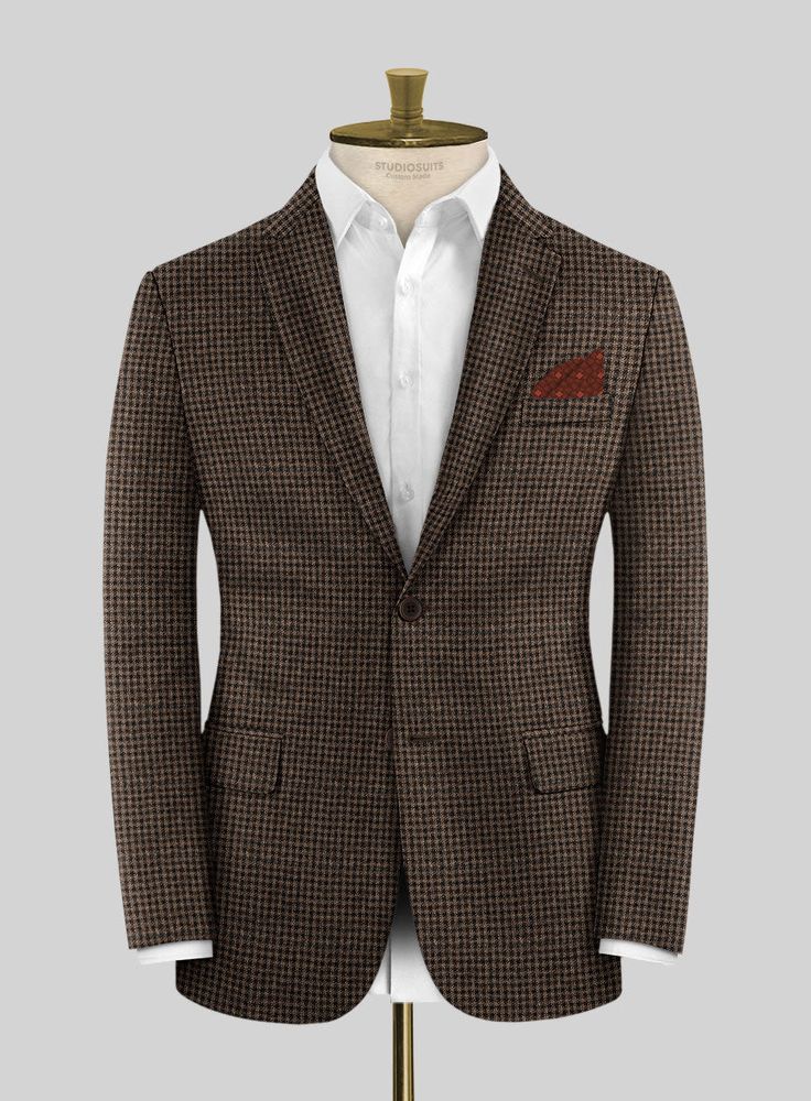 Wrap yourself in distinction with our Loro Piana Camilla Wool Jacket – a harmonious blend where elegance converges with the crescendo of fashion. Meticulously tailored from pure wool fabric, this jacket features a captivating plaid pattern, seamlessly merging brown and black hues. This results in a fusion of tradition and modernity that prioritizes comfort and functionality. Whether you're attending a relaxed dinner or navigating a pivotal professional encounter, this jacket stands as the quinte Green Tweed Suit, Blue Linen Suit, Red Corduroy Jacket, Brown Tweed Suit, Blue Linen Pants, Tweed Sport Coat, Tweed Pants, Beige Jacket, Herringbone Tweed