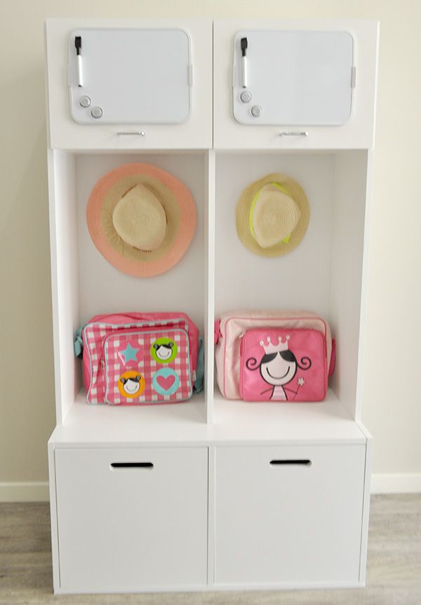 two white shelves with hats and purses on top of each shelf in front of a wall