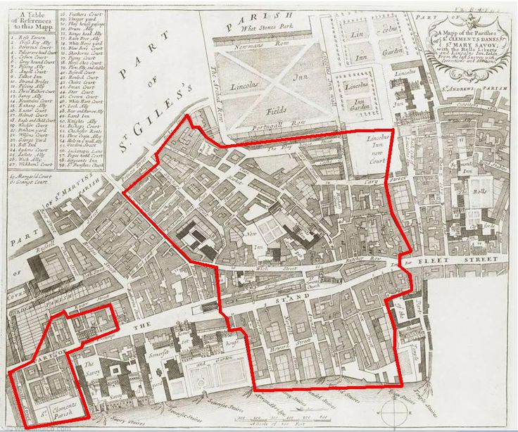 an old map shows the location of several buildings and streets, with red lines on them