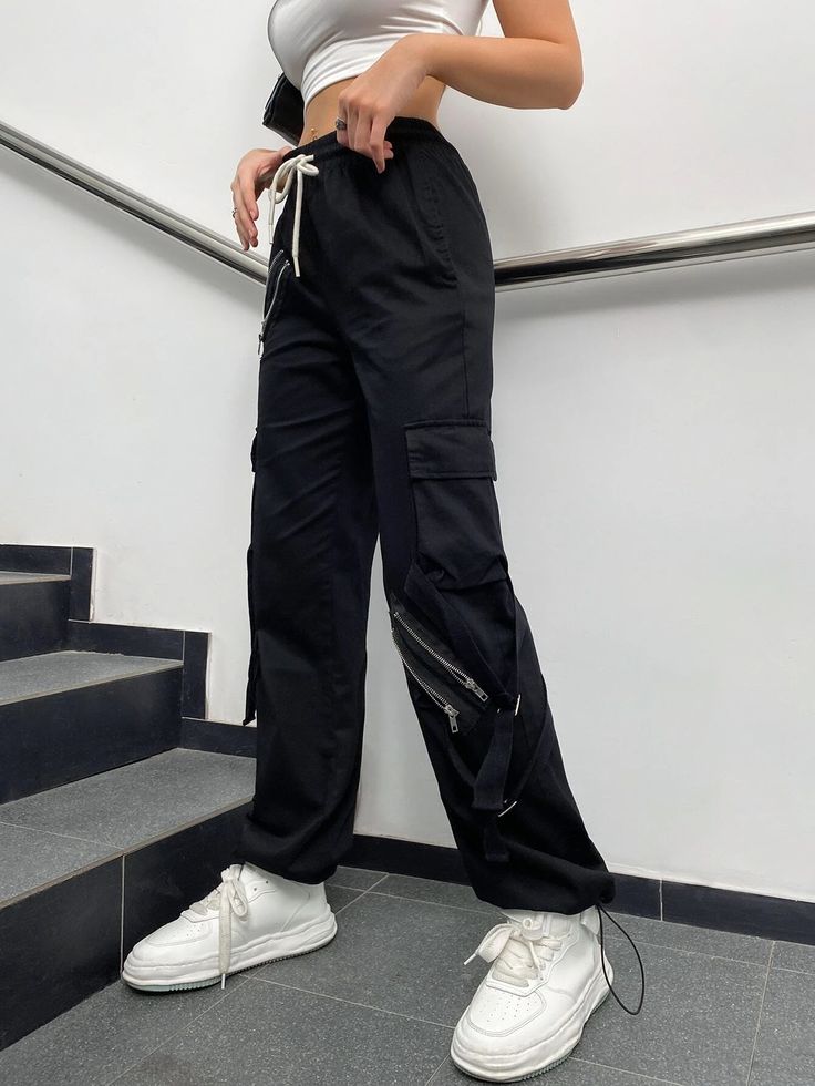 Make a fashion statement with these Zipper Detail Drawstring Cargo Pants. These pants feature a drawstring waist for a comfortable fit and zipper details that add a touch of edgy style. The combination of functionality and fashion makes them a versatile choice for various occasions. Whether you're going for a casual or street-style look, these zipper detail drawstring cargo pants will elevate your outfit. Specifications: Style: Casual Type: Cargo Pants Details: Drawstring, Pocket, Zipper Waist L Techwear Cargo Pants With Zipper For Streetwear, Straight Leg Bottoms With Zipper Pocket For Streetwear, Edgy Pants With Zipper Closure For Streetwear, Edgy Streetwear Bottoms With Zipper Closure, Edgy Streetwear Pants With Zipper Closure, Utility Bottoms With Zipper Closure For Streetwear, Techwear Parachute Pants With Zipper Closure For Streetwear, Utility Parachute Pants With Zipper For Streetwear, Urban Bottoms With Zipper Closure For Streetwear