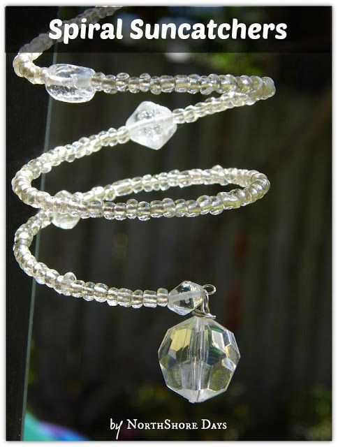 an image of a necklace made out of glass beads and crystal stones with the words spiral suncatchers on it