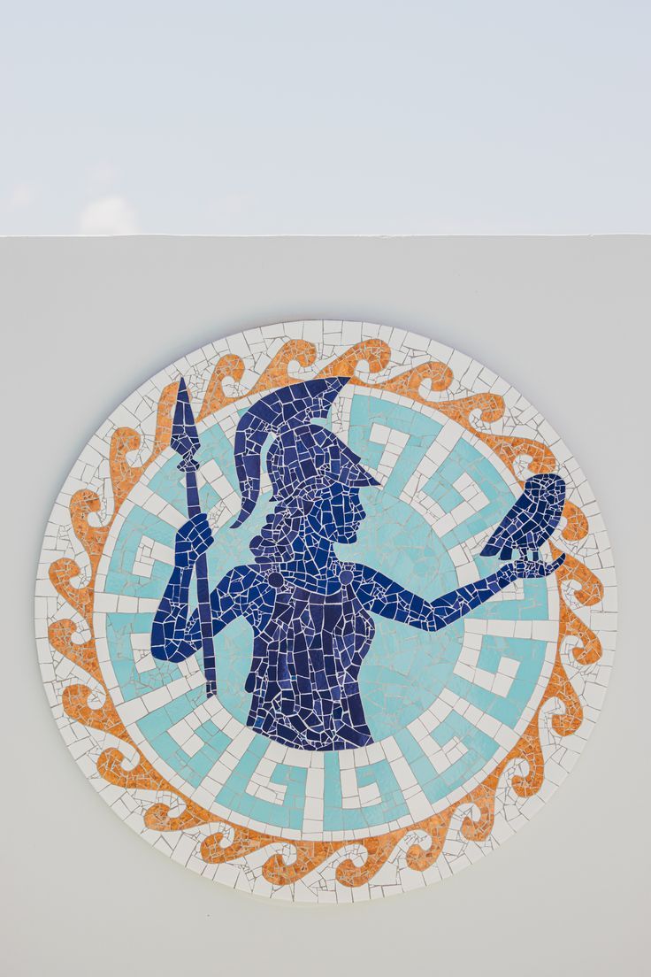 Mosaic Greek Goddess Athena at Meandros Boutique & Spa Hotel in Zakynthos Island, Greece. Artist: Linda Rinke/ Tílde Mosaic. Photo: Amalija Andersone. Recycled ceramic tiles on wood. #mosaic #mosaico #Greece #GreekGoddess #Athena #trencadis #tildemosaic #lindarinke Mosaic Art Greek, Mosaic Tile Art Ideas, Greece Tiles, Greek Mosaic Art, Greek Tiles, Greek Mosaic, Greek Plays, Greece Design, Most Beautiful Photos