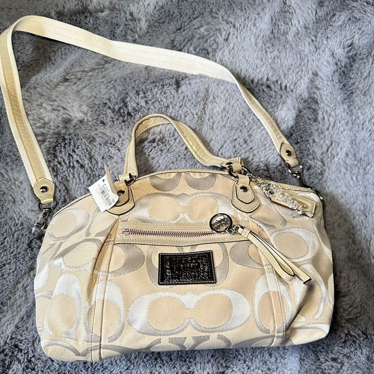 Coach 16295 Gold/Beige Bag; Nwt; Has Removable Crossbody Strap; Comes With Dust Bag; Has Gold Shimmer To It Coach Cream Bags With Removable Pouch, Coach Bags With Removable Pouch In Cream, Coach Cream Shoulder Bag For Daily Use, Luxury Cream Shoulder Bag With Zipper Closure, Designer Cream Bag With Detachable Strap, Designer Cream Bags With Adjustable Strap, Designer Cream Satchel Bag, Coach Cream Bag With Detachable Handle, Coach Cream Shoulder Bag With Handle Drop