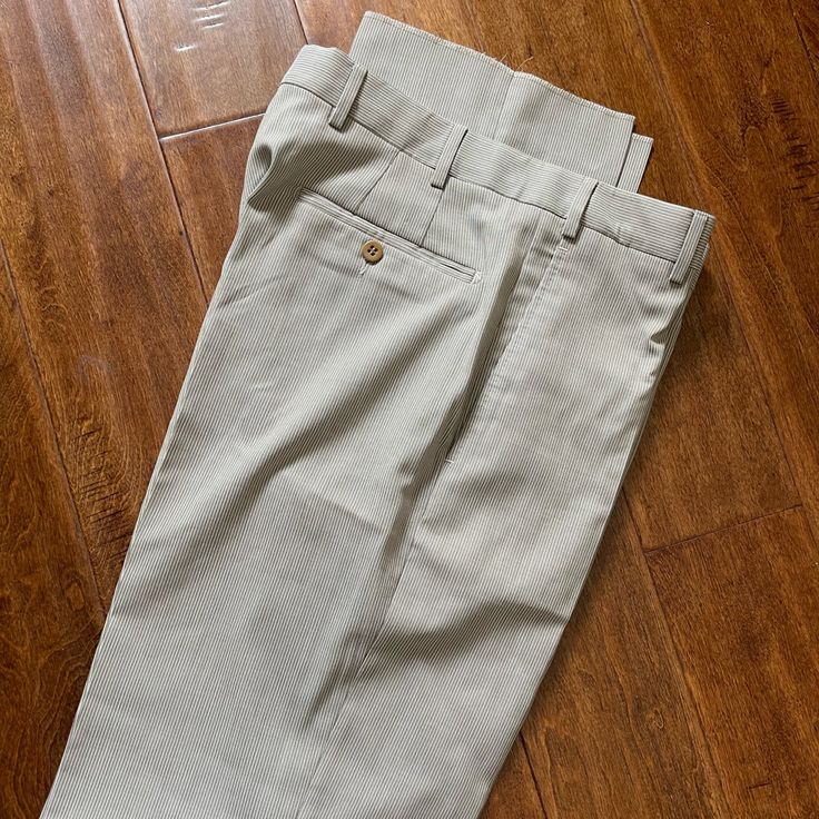 Zanella Dress Pants. Size 33 Never Worn. Light Beige Pin Stripes. Semi-formal Beige Trousers, Khaki Fitted Full-length Bottoms, Fitted Beige Chinos, Fitted Full-length Khaki Bottoms, Fitted Full Length Khaki Bottoms, Fitted Full-length Beige Chinos, Fitted Full Length Beige Chinos, Elegant Full-length Chinos For Spring, Elegant Full Length Chinos For Spring