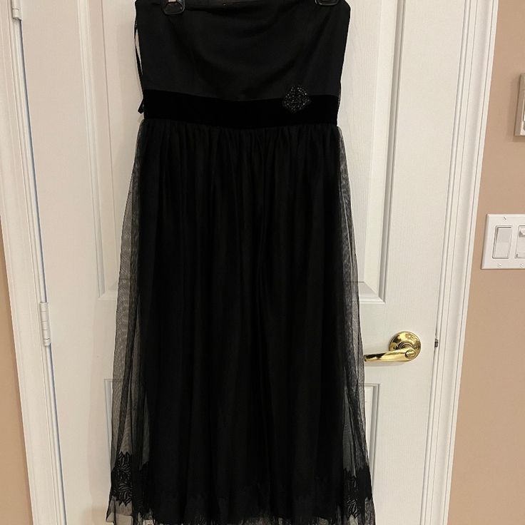 Beautiful Like New Black Chiffon Embroidered At The Bottom Dress. Strapless With Velvet Ribbon And Appliqu. Worn Once For Daughters Wedding.Size 10 But Runs Small. Tea Length Black Dress, Black Tea Length Dress, Daughters Wedding, Vera Wang Dresses, Black Chiffon, Tea Length, Velvet Ribbon, Vera Wang, New Black