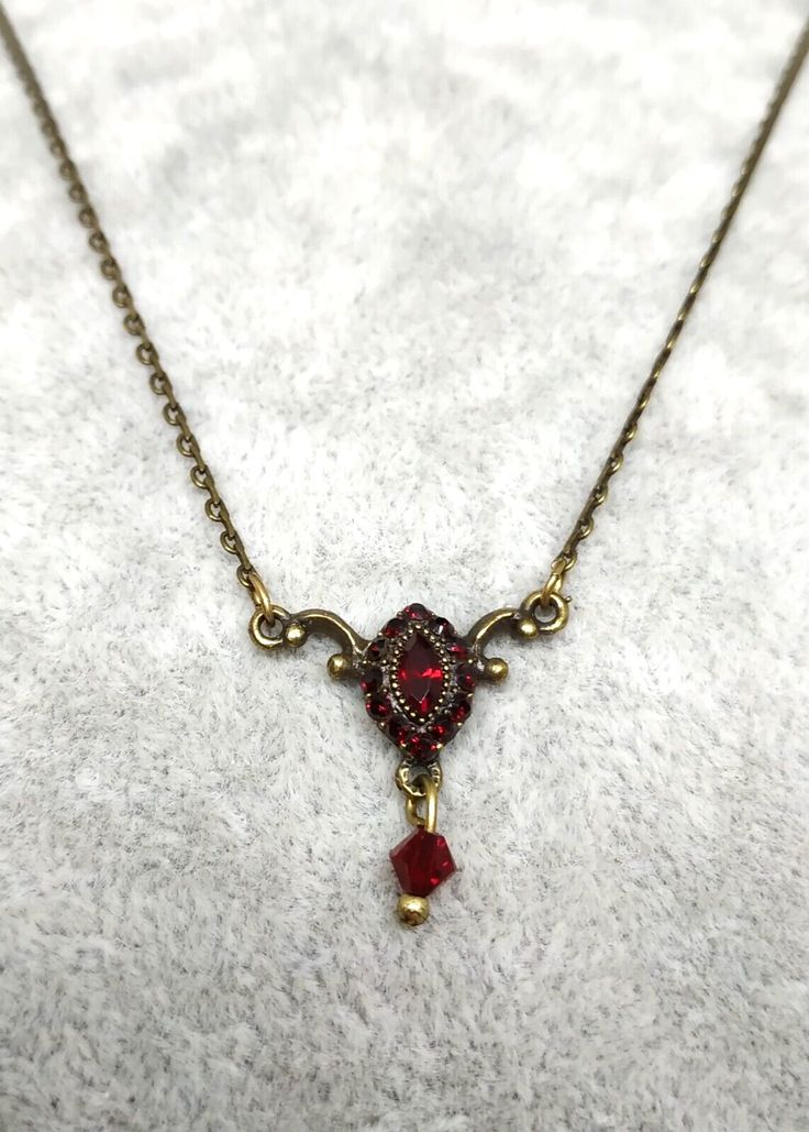 Delicate Necklace With Pendant  Crystal in Red Tones By Michal Negrin Length : 47.00  cm = 18.50" pendant : 2.00 cm x 2.00 cm = 0.79" x 0.79" Please, see all photos. Item sell as is!!! Shipping world wide at flat rate of 19$, via registers air mail. Signed for mail. I will be happy to combine shipping. I accept paypal payment only. Feel free to Check My Other Gorgeous items in my store. Red Pendant Necklace With Lobster Clasp, Classic Red Pendant Necklace, Red Adjustable Classic Jewelry, Elegant Red Necklace For Christmas, Red Christmas Necklaces For Jewelry Making, Formal Red Pendant Necklace, Elegant Red Christmas Necklace, Classic Handmade Red Necklace, Vintage Red Necklace With Lobster Clasp