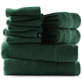 green towels stacked on top of each other