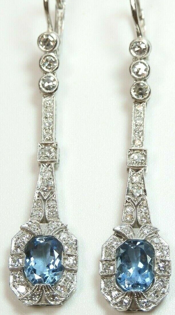 ART DECO SANTA MARIA NATURAL AQUAMARINE + DIAMOND EARRINGS (See Video Below) {International Buyers Are Responsible For Customs & Duty Fees} Circa ~ 1930'S 2 ~ Natural Aquamarines Shape ~ Oval Color ~ Medium - Dark Blue 1 ~ 8.12 MM x 6.10 MM x 3.91 MM (1.11 Carat) 1 ~ 8.02 MM x 6.10 MM x 3.65 MM (1.07 Carat Size ~ 2.18 Carat Total Weight Country Of Origin ~ Brazil (Santa Maria Mines) 56 ~ Round Single Cut Natural Diamonds Total Weight ~ 1.10 Carat Color ~ F - G Clarity ~ VS 1 - VS 2 Overall Lengt Classic Blue Platinum Earrings, Formal Hallmarked Platinum Earrings, Platinum Hallmarked Earrings For Anniversary, Platinum Hallmarked Anniversary Earrings, Formal Oval Art Deco Earrings, Oval Art Deco Earrings For Formal Occasions, Art Deco Formal Earrings Hallmarked, Art Deco Oval Earrings For Formal Occasions, Silver Art Deco Platinum Diamond Earrings