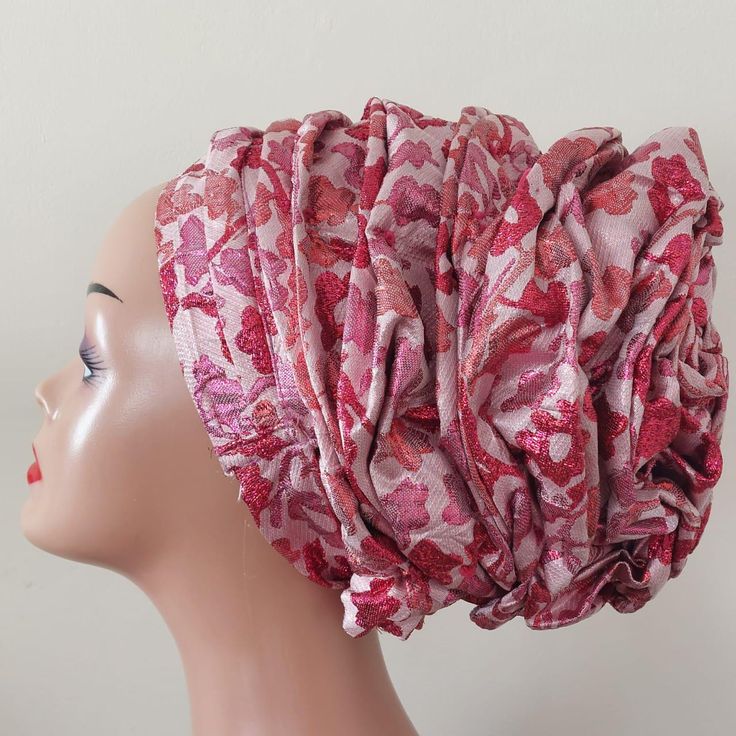 Add a touch of elegance to your wardrobe with our exquisite tones of pink pretied headgear/Turban, crafted from luxurious non-stretchy cotton fabric in our Omo'ba collection. This ready-to-wear turban is designed to fit all head sizes comfortably, thanks to its thoughtful one-size-fits-all design. The turban features two short ropes at the back, allowing you to adjust and secure it to your perfect fit. Key Features:     > One Size Fits All: Suitable for all head sizes.     > Premium Fabric: Made from high-quality, non-stretchy damask material for a sophisticated look.     > Adjustable Fit: Equipped with two short ropes at the back for additional tightening and a secure fit.     > Turban Volumizer: Recommended for extra volume but entirely optional.     > Care Instructions: To maintain the Elegant Adjustable Red Turban, Elegant Red Headwrap For Wedding, Elegant Red Headwrap, Elegant Red Fitted Headwrap, Fitted Headband Bonnet For Wedding, Elegant Wedding Headwrap, One Size Fits Most, Red Adjustable Headwrap For Party, Party Turban Hat, Fitted Wedding Turban Headband