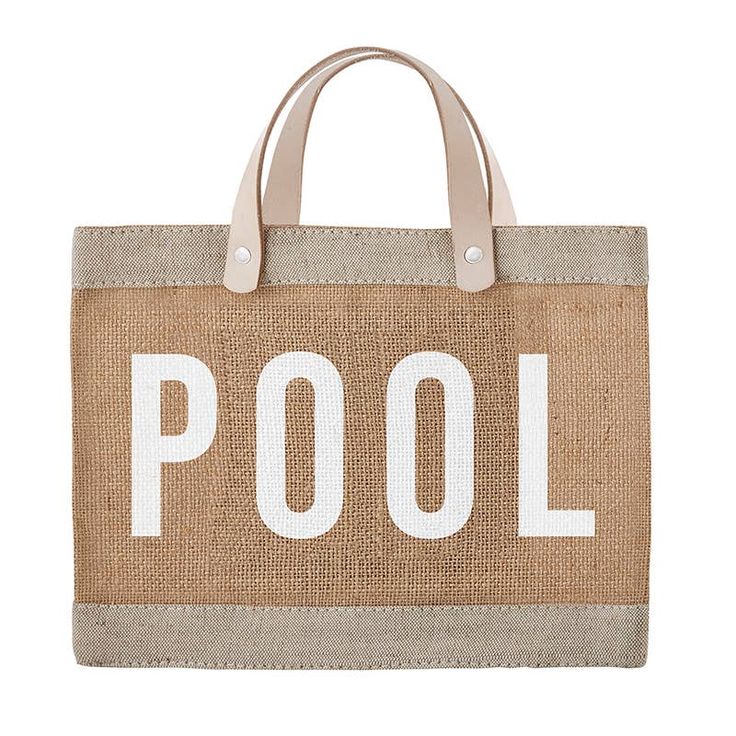 Your favorite tote just got a lot smaller but in a big way! · Inside pocket for organization. · Waterproof lining for accidental spills. · Material: Jute/Genuine Leather/Polyurethane Lining · Size: 12.5" W x 9.5" H x 5.5" D / Inside Pocket - 5.25" W x 6.5" H · Care Instructions: Spot Clean Only Modern Tan Bags For Summer, Tan Bags For Summer Errands, Santa Barbara Design, Mini Pool, Mini Market, Jute Totes, Curated Gift Boxes, Market Tote, Gifts For Office