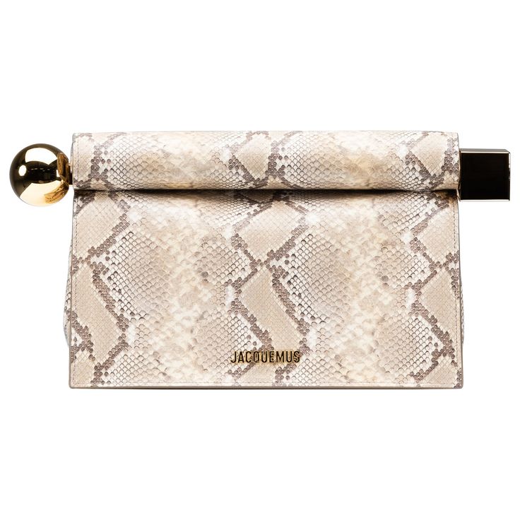 From the collection of SAVINETI we offer this NEW Jacquemus Take-out Clutch: - Brand: Jacquemus - Model: Clutch Les Sculptures - Color: Beige - Year: 2024 - Condition: NEW (unused) - Extras: Full-Set (Dustbag, Box & Receipt) Details: - Faux-python folded clutch - Rolls open to access interior - Large gold metal circle and square closure endings - Magnetic interior closure - Interior patch pocket - Gold metal logo and hardware - Fully lined in cotton Authenticity is our core value at SAVINETI and Beige Pouch Clutch With Gold-tone Hardware, Fashion Accessory Pouch Clutch With Detachable Strap, Beige Clutch, Metal Circle, Gold Clutch, Sculptures For Sale, Core Values, Year 2024, Metal Logo