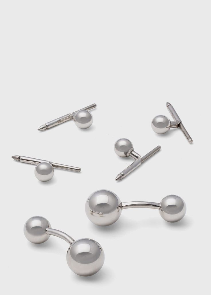 Sterling Silver Ball Cufflink & Stud Set. Paul Stuart is one of the oldest and most well respected names in fashion, offering exclusive and custom tailored clothing, sportswear, footwear and accessories for men and women. Renowned for expert craftsmanship, thoughtful design using materials and fabrics sourced from the finest mills around the world, Paul Stuart combines Savile Row, Old Hollywood and a very distinct New York vibe to create timeless American classics with contemporary sophistic Silver Designer Cufflinks For Business, Designer Silver Cufflinks With Polished Finish, Modern Round Cufflinks For Formal Occasions, Modern Sterling Silver Cufflinks For Formal Wear, Modern Sterling Silver Cufflinks For Formal Occasions, Modern White Gold Cufflinks With Polished Finish, Modern Polished Cufflinks For Formal Occasions, Modern White Gold Cufflinks For Business, Modern Sterling Silver Cufflinks For Business