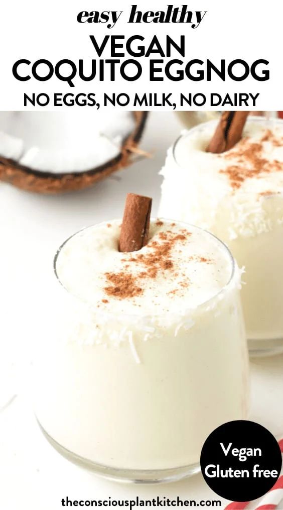 two glasses filled with coconut milk and cinnamon garnish on top of each other