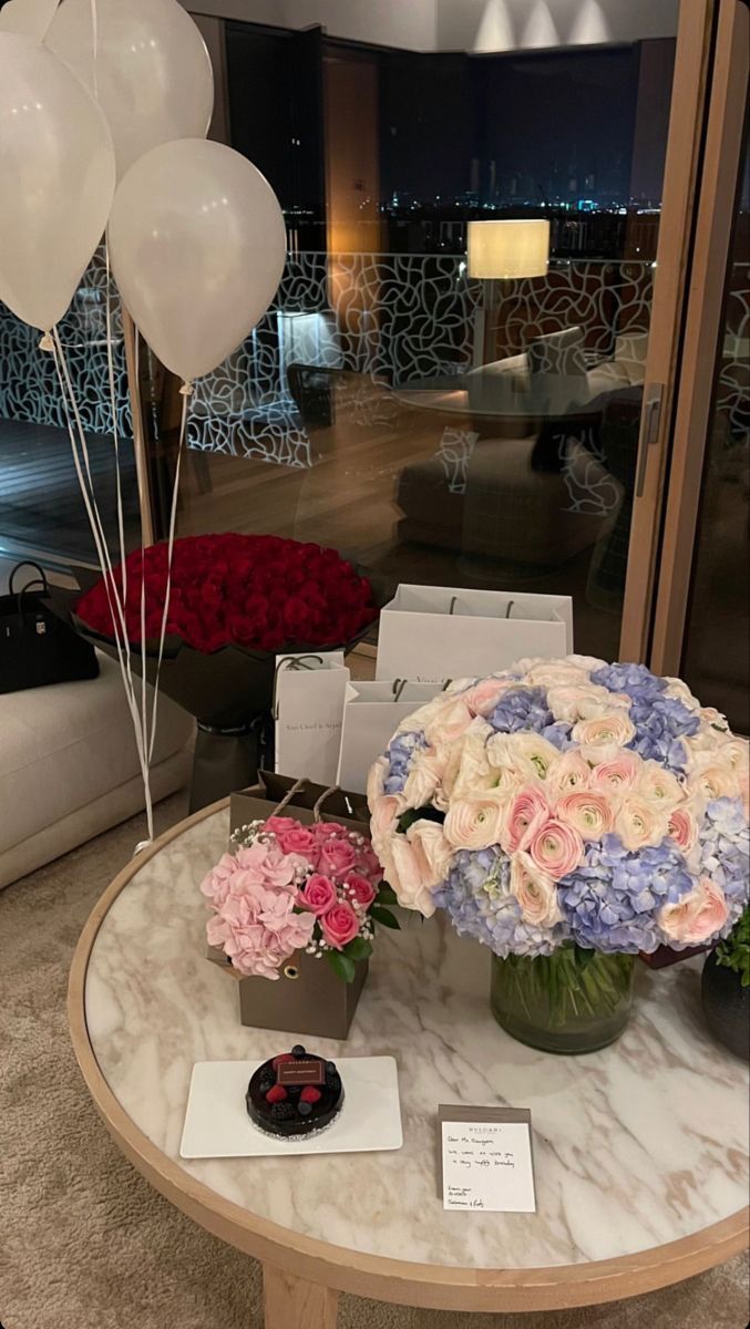 flowers and balloons are on display in the lobby