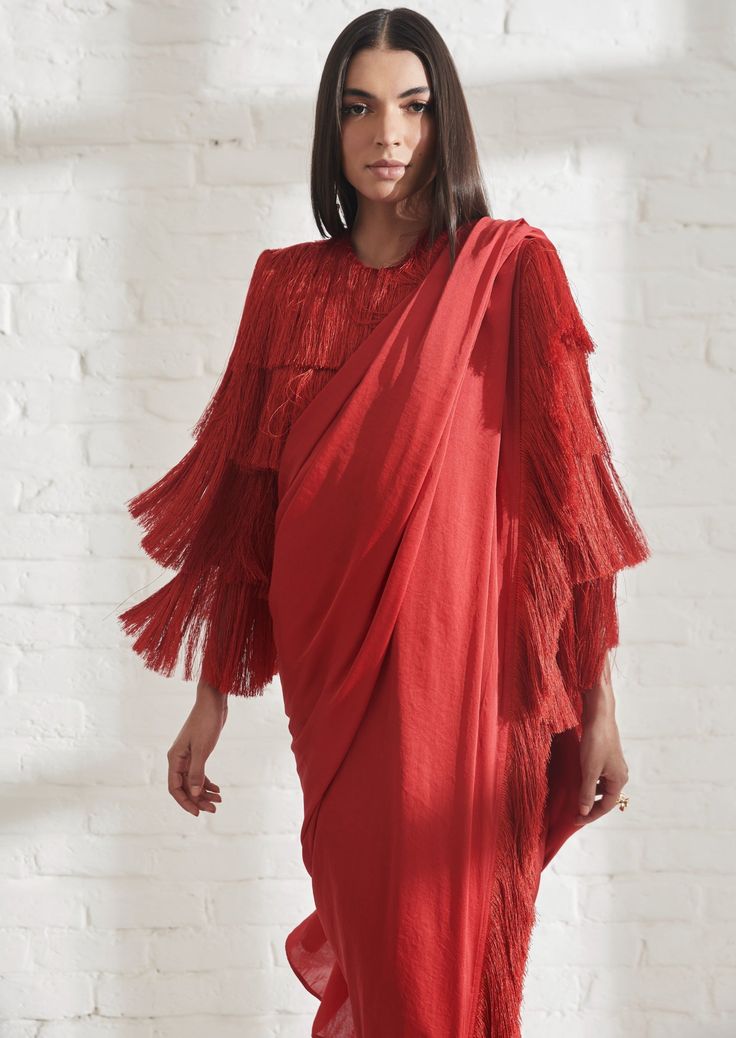 Our noor fringe sari features a full pre-draped sari that looks like a regular sari with our signature fringe detail. Pair it with the fringe jacket or get in touch for more blouse options. Additionally wear the fringe jacket over your favorite jeans. Traditional Fringe Shawl One Size, Red Fringe Jacket, Red Bohemian Pre-draped Saree, Traditional Fringe Shawl Scarf, Luxury Fringed Shawl, Fringe Jacket, Favorite Jeans, That Look, Red