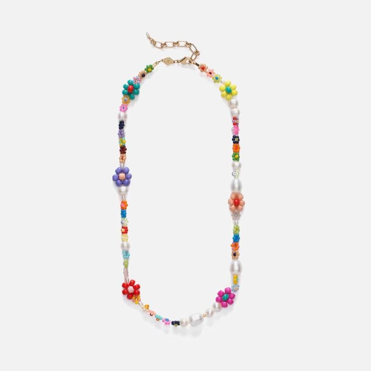 Layer high-summer wardrobe edits with even bolder accessories this season, starting with this Anni Lu Maxi flower necklace. Threaded with multicoloured glass and shell beads in a floral design, this piece adds a colourful accent to simple jewellery collections. Its playfulness is tempered with a selection of freshwater pearls and an 18-karat plated brass fastening..Anni Lu Mexi necklace.Freshwater pearls, multicoloured glass and shell beads.Lobster clasp fastening.Length: 46cm Anni Lu Bracelet, Pearl And Bead Necklace, Tiger Necklace, Simple Jewellery, Dainty Chain Necklace, Pear Pendant, Dance Necklace, Bold Accessories, Bracelet Ideas