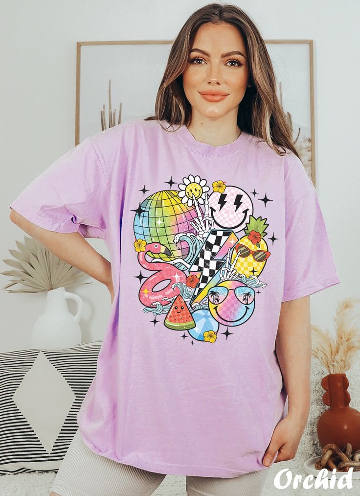 Get ready to rock that casual chic look with our Funny Smiley Face T-shirt ❤️ Get retro with this smiley Graphic Tee! Featuring smiley faces and a nostalgic vibe, this design is perfect for all the cool beach bums out there. Show off your retro style and spread some positive vibes with this fun and funky t-shirt. ❤️ Size up, babe! Go 1-2 sizes bigger for that oversized stunner. Elevate your style, own the spotlight, and unleash your fashion power. It's time to rock the room with your effortlessl Retro T-shirt For Vacation, Funky Tshirts Designs Graphic Tees, Retro Summer T-shirt For Day Out, Spring Casual Shirt With Cartoon Print, Spring Cartoon Print Relaxed Fit Shirt, Casual Relaxed Fit Shirt With Cartoon Print, Trendy Summer Shirt With Graphic Print, Summer Graphic Tee Shirt With Cartoon Print, Summer Cartoon Print Graphic Tee Shirt