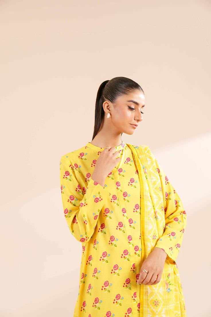 Brand: NishatCollection: Nishat Fall Fantasy Unstitched Summer CollectionFabric: Lawn Product Detail:Cross Stitch Printed Style Shirt with Dupatta and Trousers SHIRTPrinted Lawn Shirt: 3 MeterFabric: LawnColor: Yellow DUPATTAPrinted Doriya Dupatta: 2.5 MeterFabric: DoriyaColor: Yellow TROUSERSSolid Cambric Trousers: 2.5 MeterFabric: CambricColor: Yellow DISCLAIMER:* Lining, Laces, and Tassels are not included in unstitched variants.* Embellishment items in stitched outfits are subject to market availability.* The actual colors of the outfit may vary from the colors being displayed on your device. CARE INSTRUCTIONS: Extra Fabric Has Been Used For Shoot Original Color May Vary Slightly From The Picture Dry Clean Recommended Iron The Clothes At Moderate Temperature Do Not Use Bleach, Or Stain Spring Designer Sets With Printed Motifs, Designer Spring Sets With Printed Motifs, Traditional Sets With Set-in Sleeves For Eid, Designer Long Sleeve Pant Set With Printed Motifs, Elegant Yellow Sets With Printed Motifs, Printed Motifs Fitted Long Sleeve Sets, Designer Wear Sets With Set-in Sleeves For Eid, Fitted Long Sleeve Sets With Printed Motifs, Designer Wear Fitted Sets With Printed Motifs