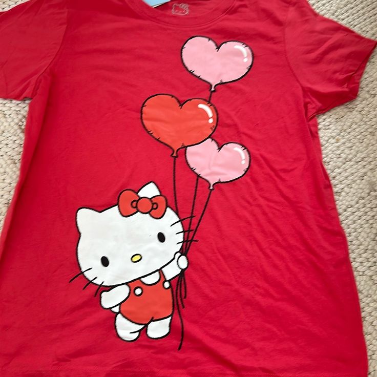 Hello Kitty Nwt Short Sleeve Shirt Size Large. The Color Is A Mix Of Red And Pink. This Short Sleeve Shirt Is So Cute!!! Thanks For Looking. Ships From Atlanta Smoke And Pet Free Home Hello Kitty Playful Hello Kitty Short Sleeve Tops, Red Cartoon Print Top For Spring, Fun Red Shirt With Cartoon Print, Fun Hello Kitty Short Sleeve Tops, Playful Fitted Red Tops, Fun Red Top With Cartoon Print, Red Fitted Fun Top, Fitted Fun Red Top, Fun Fitted Red Tops