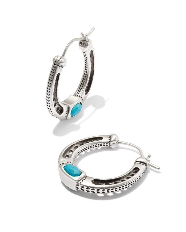 Meet every cowgirl’s dream hoop earring: the Noble Vintage Silver Horseshoe Hoop Earrings in Variegated Dark Teal Magnesite. Crafted in a horseshoe shape, these earrings feature a petite stone detail for an eye-catching pop of color. These earrings are a part of Yellow Rose by Kendra Scott——a brand that celebrates ranch life with Kendra Scott staples alongside select curated jewelry pieces and accessories. Metal Vintage Silver Over Brass Material Variegated Dark Teal Magnesite Closure Ear Post S Western Fashion Jewelry, Teal Jewelry, Vintage Silver Earrings, Horseshoe Earrings, Horseshoe Pendant, Cute Country Outfits, Western Clothes, Bar Jewelry, Western Earrings