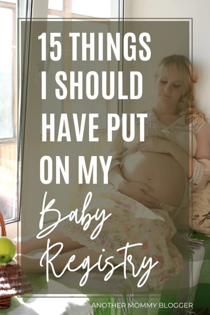 a pregnant woman sitting in bed with the words, 15 things i should have put on my baby registry