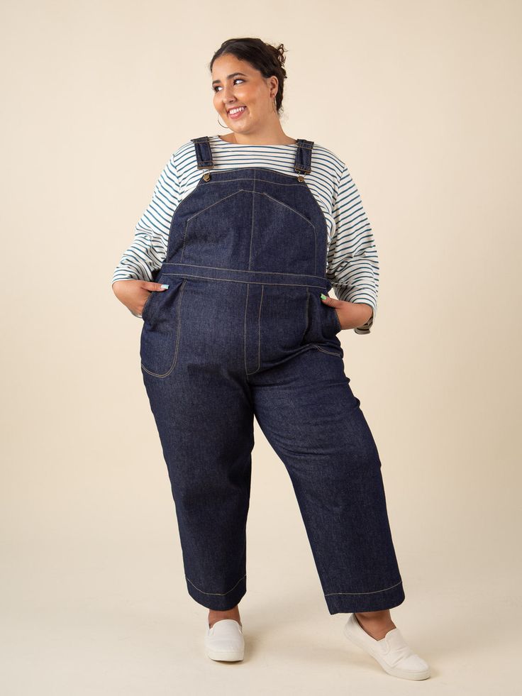 Inspired by vintage work-wear, Jenny is a modern interpretation of classic overalls and wide-leg trousers with an ultra-high rise, sleek, functional details and a comfortable all-day-long fit. Make a more sophisticated version of dungarees with our well-proportioned bib and optional utility pocket, or omit the bib entirely and make a pair of wide-legged cropped pants, full-length pants or shorts. Optional details abound; mix and match the curved slash front pockets, faux fly front, single or dou Wide Leg Overalls For Fall Workwear, Cotton Denim Jumpsuit For Work, Relaxed Fit Wide Leg Overalls With Pockets, Cotton Overalls With Belt Loops For Work, Utility Overalls With Belt Loops For Workwear, Workwear Overalls With Straight Leg And Side Pockets, Relaxed Fit Bib Front Bottoms For Fall, Utility Wide Leg Overalls With Pockets, Utility Wide-leg Overalls With Pockets