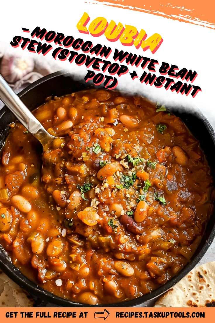 a bowl filled with beans and vegetables next to tortilla chips