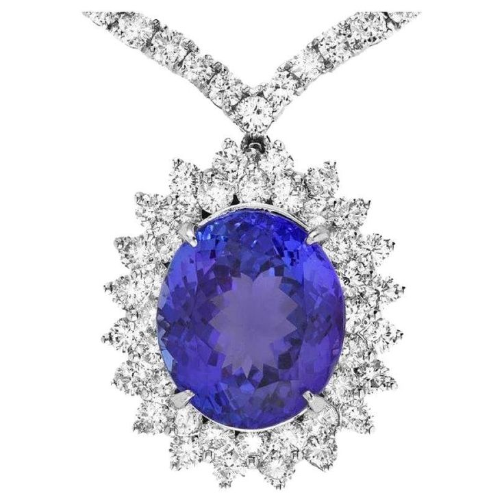 22.80Ct Natural Tanzanite and Diamond 18K Solid White Gold Necklace Total Natural Oval Tanzanite Weight is: Approx. 11.90 Carats Tanzanite Measures: Approx. 15 x 13 mm Total Natural Diamond Weight is Approx. 10.90Ct (color G-H / Clarity SI1-SI2) Necklace Length is 18 inches Total item weight is: Approx. 25 grams Disclaimer: all weights, measurements and colors are approximate and may vary slightly from the listed dimensions or as seen in the image. All pictures are magnified to show the smallest Gold Movie, Solid Necklace, White Gold Necklace, Tanzanite Diamond, White Gold Necklaces, Natural Tanzanite, Drop Necklace, Quality Diamonds, Wedding Necklace