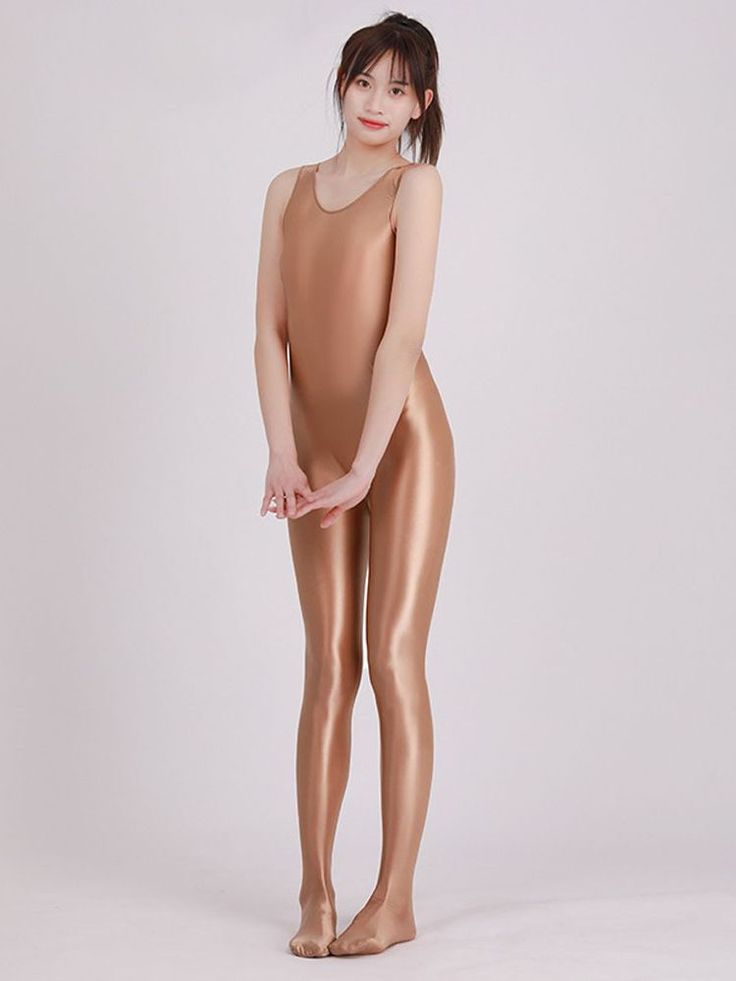 Introducing our alluring Glossy Pantyhose Bodystocking Tights â€?the epitome of sensual elegance and modern sophistication. Designed to accentuate your curves and elevate your style. these tights are a must-have addition to your wardrobe.Our Glossy Pantyhose Bodystocking Tights are the perfect fusion of sexy and club-worthy fashion. With their sleek and shiny finish. they exude an air of irresistible allure. making them ideal for a night out on the town or a special romantic evening.Crafted from Solid Color Fitted Dancewear Hosiery, Fitted Full-length Dancewear Tights, Fitted Full Length Dancewear Tights, Full Length Fitted Dancewear Tights, Full-length Compression Tights For Dancewear, Compression Full-length Dancewear Tights, Fitted High Waist Elegant Legwear, Fitted Full-length Dancewear Hosiery, Elegant Full-length Compression Tights