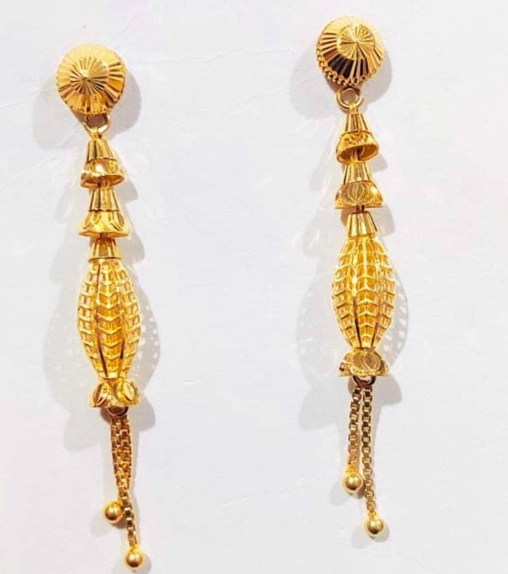 22k Solid  Gold Long Earrings- Chain Earrings-Threader Earrings-Chain Dangle  and drop Earrings- Indian Threader Earrings This is beautifully handmade Indian 22k Solid Gold Long Chain Bell Earrings which is designed keeping in view the Indian Vintage Rajasthani Look with Modern touch that gives you remarkable look. PRODUCT SPECIFICATION: Material : 22k Solid Gold Weight: 4 Gram approx  NOTE: We accept Custom order and Custom size as well! Customer Satisfaction is our utmost priority, feel free t Gold Plated Dangle Plug Earrings For Wedding, Hear Rings Ears Gold, Gold Dangle Earrings For Wedding, Yellow Gold Pierced Danglers For Wedding, Wedding Yellow Gold Danglers, Yellow Gold Bridal Dangle Earrings For Festive Occasion, Festive Yellow Gold Bridal Dangle Earrings, 22k Gold Chandelier Earrings With Latkans For Gift, Gold Linear Pierced Earrings For Wedding