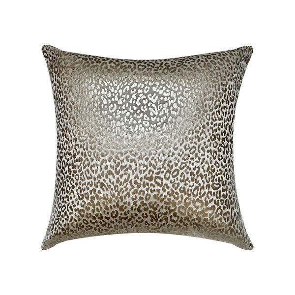 a leopard print pillow with silver foil on the front and back, it has a square shape