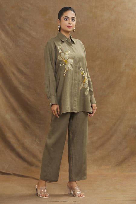 Buy Green 100% Linen Embroidery Thread Spread Collar Floral Shirt For Women by Linen Bloom Online at Aza Fashions. Embroidered Collared Tops For Work, Embroidered Collared Blouse With Relaxed Fit, Traditional Collared Tops With Floral Embroidery, Embroidered Collared Blouse Relaxed Fit, Traditional Spring Workwear Tops, Long Sleeve Shirt With Floral Embroidery And Relaxed Fit, Embroidered Relaxed Fit Collared Blouse, Relaxed Fit Long Sleeve Shirt With Floral Embroidery, Traditional Embroidered Tops For Workwear