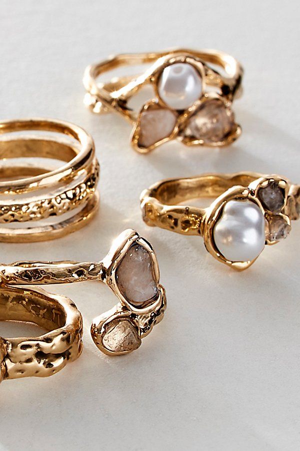 Deck out your hands with this pearl-adorned ring set. **Features:** Set of 6, thick metal band, natural shaped bands, pearl and stone inlays **Why We | Bay Side Ring Set by Free People in Gold Pearl And Stone Ring, Simple Gold Jewelry Rings, Gold Rings Real, Ring Inspo Jewelry Gold, Gold Ring Sets Aesthetic, Gold Rings Styling, Boho Ring Stack, Mixed Metals Rings On Hand, Cool Ring Stacks