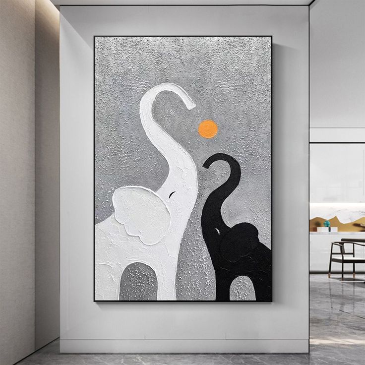 an elephant and giraffe are depicted in this modern art piece on the wall