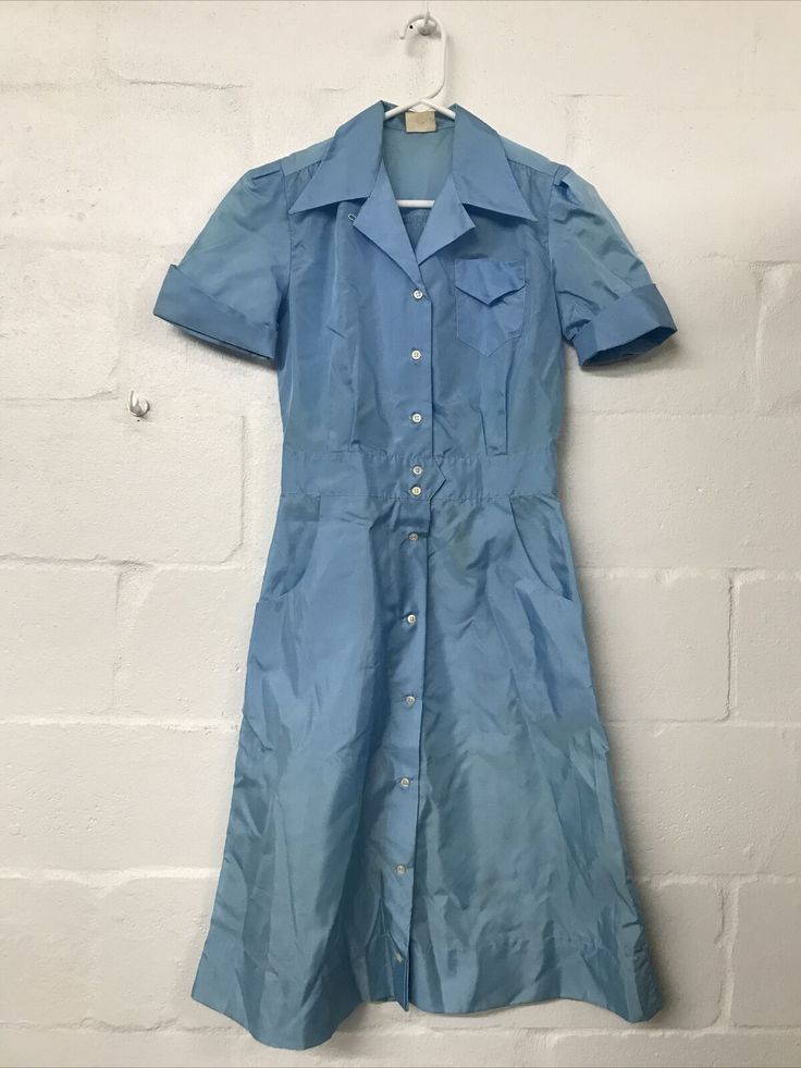 Good Condition. Small Stains. No Size Tag. Length- 43.5in. Pit to pit- 18.5in. Waist- 28in. Blue 1950s Style Knee-length Vintage Dress, Blue Knee-length Vintage Dress 1950s Style, Blue Knee-length 1950s Vintage Dress, Fitted Retro Vintage Dress With Button Closure, Vintage Dress With Button Closure For Vintage Fashion, Retro Blue Knee-length Vintage Dress, Spring Blue Vintage Dress With Buttons, Blue Vintage Dress With Buttons For Vintage Fashion, Blue Vintage Dress With Buttons