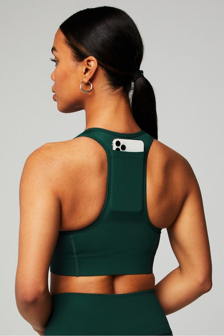 On-The-Go Zip Medium Impact Sports Bra Fabletics green female Activewear >> Womens >> Sports Bras >> Sports Bra >> Medium Impact regular Training External Pockets/Moisture-Wicking/Removable Bra Cups Green Sports Bra With Built-in Padding For Gym, Green Sports Bra With Built-in Padding For Training, Green Athleisure Sports Bra With Built-in Padding, Green Sports Bra With Built-in Padding, Green Compressive Sleeveless Sports Bra, Green Sleeveless Sports Bra For Gym, Green Athleisure Sports Bra, Green Athleisure Sleeveless Sports Bra, Functional Green Sleeveless Sports Bra