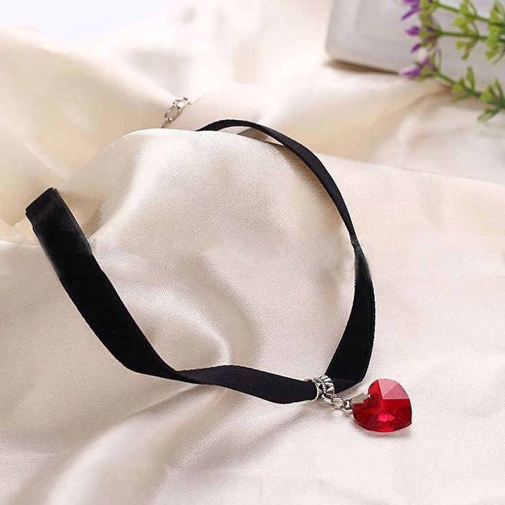 Gothic Women Fashion Jewelry Teen Girl Gift Idea, bridesmaid girl, flower girl, party jewelry, Valentine's necklace Cord Material: Black Velvet Length: 31cm plus 5cm (extension) Charm: Heart shape Crystal in 6 different colors Visit our shop to check out other unique items: https://www.etsy.com/shop/SecretBelladonna Heart-shaped Rhinestone Necklace As Gift, Heart-shaped Rhinestone Necklace For Gift, Heart Pendant Jewelry For Mother's Day Party, Party Heart Choker Necklace With Clavicle Chain, Valentine's Day Heart Necklace With Clavicle Chain For Parties, Elegant Heart Choker As Gift, Elegant Heart Shaped Choker Gift, Elegant Heart-shaped Choker Gift, Elegant Heart-shaped Choker For Gift