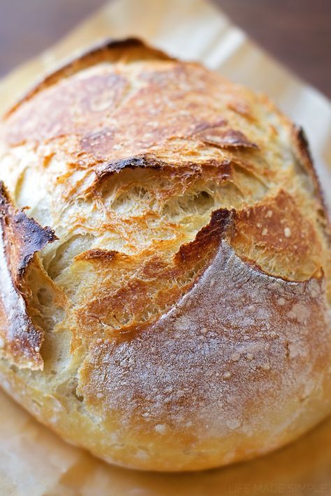 a loaf of bread sitting on top of a piece of paper