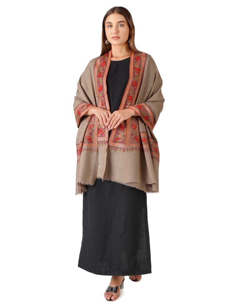 Discover artisanal excellence with our Handwoven Pashmina Shawl, meticulously crafted from pure Kashmiri pashmina in the exquisite Natural Toosh shade. This shawl embodies traditional craftsmanship and timeless elegance. Product Details: Handwoven Pashmina Shawl Material: Pure Pashmina (100% Cashmere) Size: 100 cm X 203 cm / 40 Inch X 80 Inch / 1.1 x 2.2 Yards (Approx) Base Color: Natural Toosh Embroidery: Delicate and detailed border embroidery Sourced From: Changthangi goats in the Himalayan r Elegant Unstitched Pashmina Traditional Wear, Traditional Patterned Pashmina Shawl For Eid, Traditional Handloom Pashmina Shawl, Festive Pashmina Handloom Shawl, Traditional Pashmina Shawl Scarves, Traditional Drape Shawl With Woven Motifs, Traditional Winter Shawl, Traditional Patterned Pashmina Shawl, Transitional Pashmina Shawl With Traditional Patterns