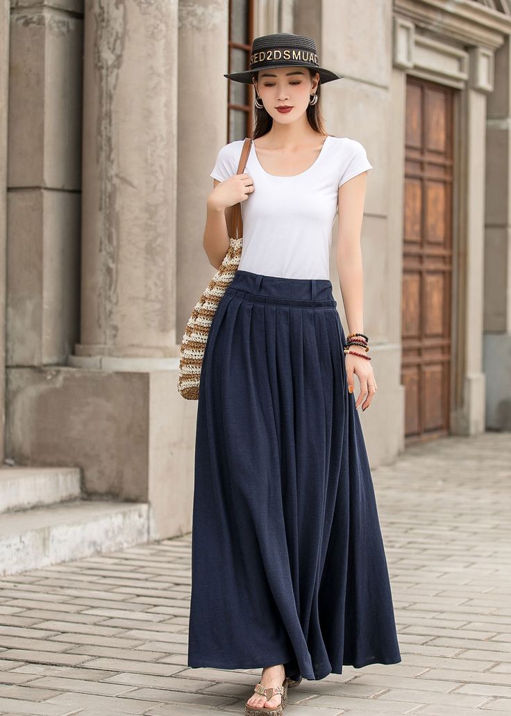 "Get dressed and out of the door in classic good looks with this pleated Long maxi skirt, crafted with soft cotton linen fabric, featuring pleated waist detail and two big pockets. DETAIL * 50% linen, 50% cotton * Has no lining, Not see through * Pleated around waist * Two side seam pockets * Belt loops on waistband * Right Side zipper closure * Perfect for spring and summer, spring, autumn * Need Help how to select the size, Just Leave Your usual wear size Height Weight Waist Hips SIZE GUIDE Si Casual Cotton Skirt With Pleated Waist, Summer Long Pleated Skirt With Pleated Hem, Long Pleated Skirt For Summer, Summer Pleated Waist Maxi Skirt, Summer Pleated Long Skirt, Summer Maxi Skirt With Pleated Waist, Elegant Cotton Maxi Skirt For Spring, Spring Full Maxi Skirt With Pleated Waist, Blue Cotton Bottoms With Pleated Waist