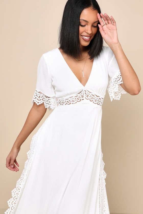 No matter the event, you'll look stunning in the Lulus Sweeten the Occasion White Lace Short Sleeve Maxi Dress! Gauzy, crinkle woven fabric shapes this splendid dress that has a deep V-neckline, flowy short sleeves, and a fitted bodice. An empire waist cascades into a maxi skirt with slits along both sides. Gorgeous sheer crochet lace accents the sleeves, waist, and sides of the skirt. Keyhole with top button closure and hidden zipper/clasp at back. Fit: This garment runs large - please size dow Flowy V-neck Lined Maxi Dress, Flowy V-neck Midi Dress With Lace Trim, Bohemian V-neck Midi Dress For Party, Chic V-neck Midi Dress With Lace Trim, Chic V-neck Maxi Dress With Lace Trim, Flowy V-neck Dress With Surplice Neckline For Date Night, Elegant Fitted V-neck Dress For Vacation, V-neck Dress With Lace Trim For Vacation, Flowy Surplice Neckline Mini Dress For Party